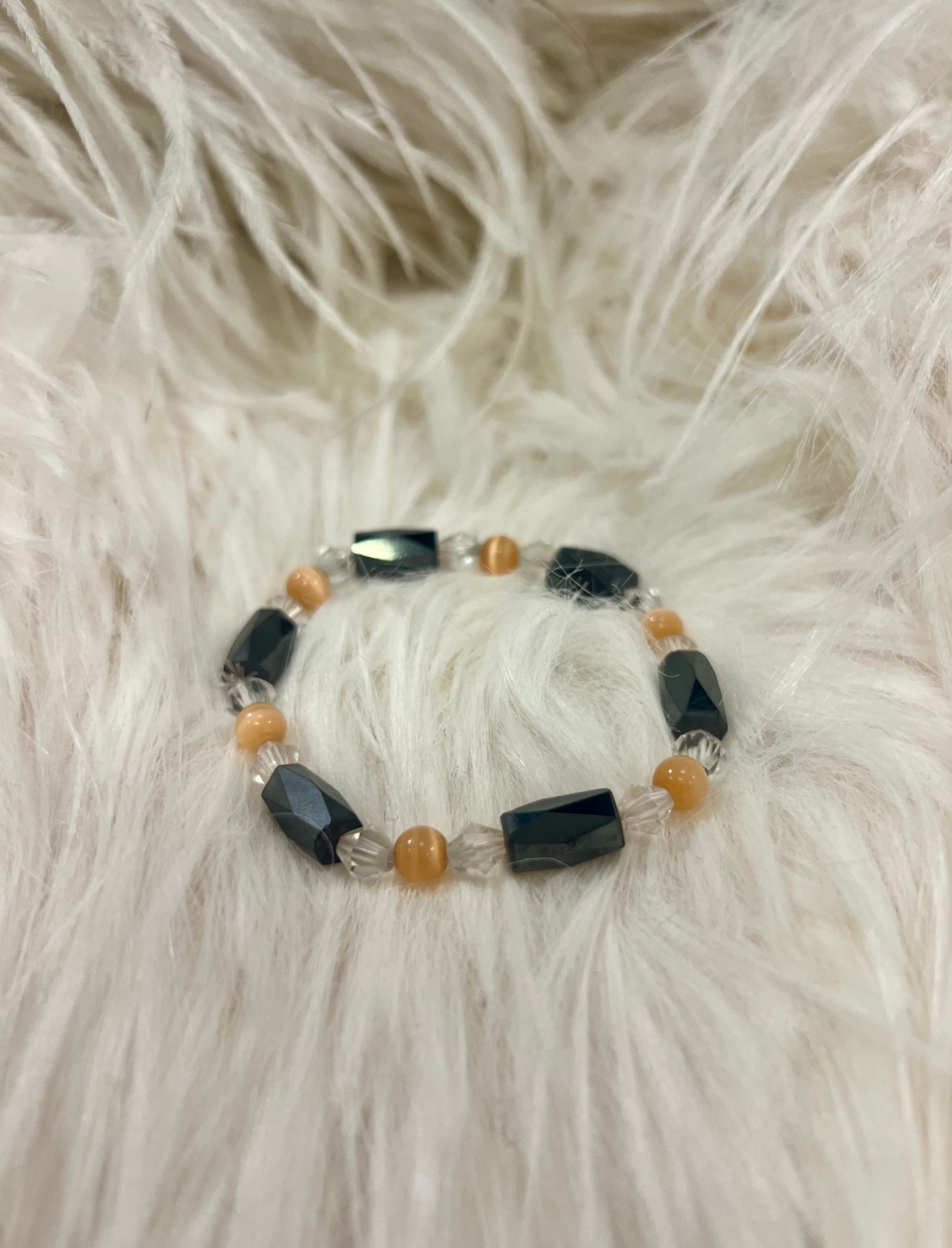 Stackable Hematite and Cats Eye Bracelets by Gill M